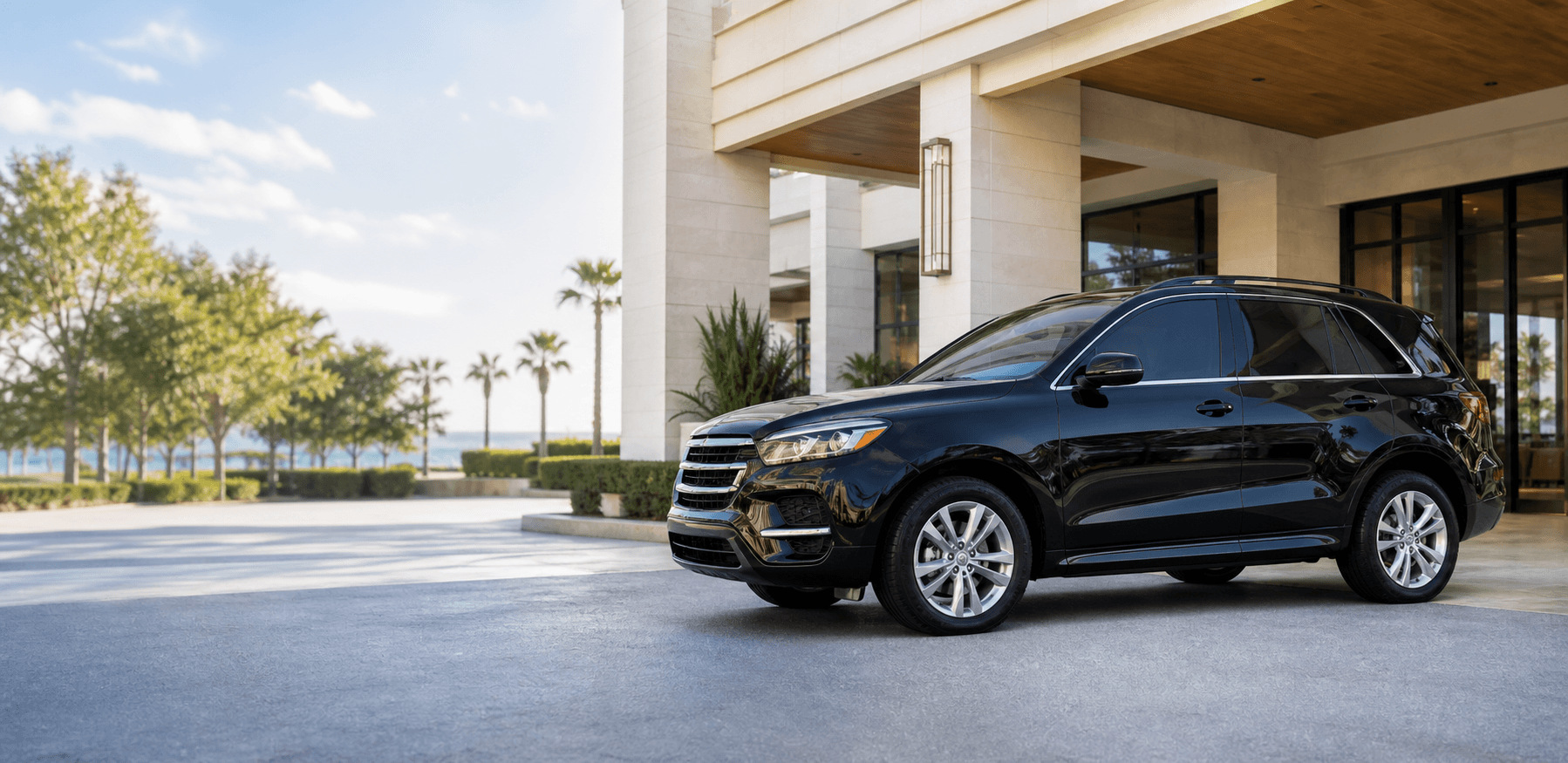 Clean modern SUV parked outside a bright welcoming entrance